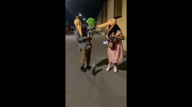 Family and dog in Halloween costumes in Real Granada, Mexico