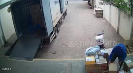 Package explodes in postman's face when he drops it at warehouse