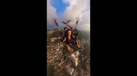 Eating while paragliding in Lebanon