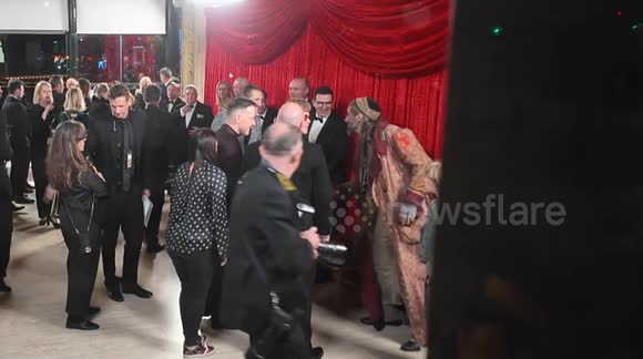 King Charles arrives at the Royal Variety Show 2024 Elton John can be seen as one of the people to great the King