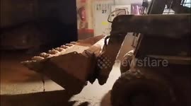 Spain: Mud-Covered Garages Spark Urgent Plea for Help in Recovery Efforts