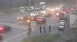 Domino effect as car fails to brake at traffic lights and knocks line of vehicles into each other