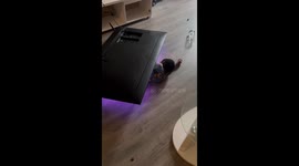 Child lays under fallen TV while watching cartoon in Villeneuve-le-Roi, France