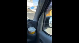 Vehicle uses wood in place of missing tire in Vladivostok, Russia