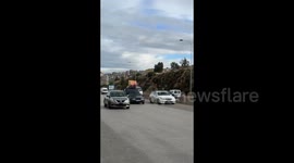 Lebanon: People on the roads of Lebanon drive with flags and banners from the windows of their cars 3