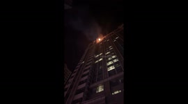 Firefighter's lifesaving mask share rescues a cat in high-rise fire