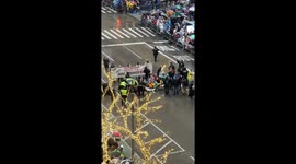 Police arrest protestors at Macy’s Parade