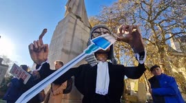 Campaigners opposed to assisted dying protest with giant effigy and 