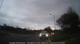 A Car goes to overtake without checking their mirrors (Close Call)