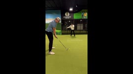 Indoor golf mishap ends with laughter after accidental hit in Redmond, Washington, USA