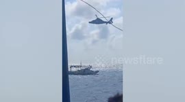 China army helicopter harasses Filipino fishermen in South China Sea