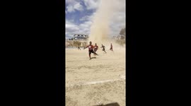 Football Match Interrupted By Whirlwind