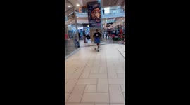 Girl falls while attempting to ride a shopping cart in Durban, South Africa