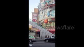Boys risk serious injury as they use escalator handrail as slides in China
