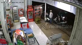CCTV video shows several youths attacking a minimarket in Indonesia