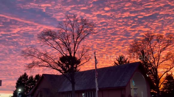 Red, Yellow & Orange puffy clouds during gorgeous sunset in Maryland USA