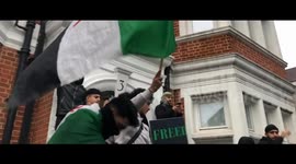 Syrian opposition supporters rally outside the Russian embassy in London