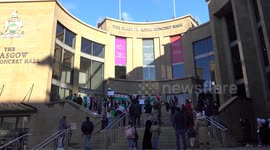 Supporters of the coup in Syria hold a demo in support of the new regime