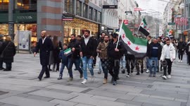 Syrian nationals have taken to the main shopping street in Vienna after their ruler left for Russia.