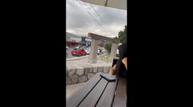 Man’s hand in woman’s pants as they walk together in Tafí del Valle, Argentina