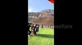 Dog utterly unfazed during paragliding trip 1,000s of metres in the air