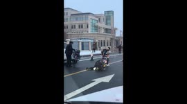 Children slipping on slippery road, caught on video in Ürümqi, China