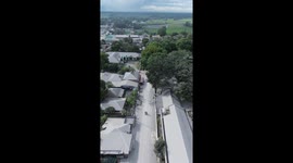 Ash covers homes after Mount Kanlaon eruption in the Philippines