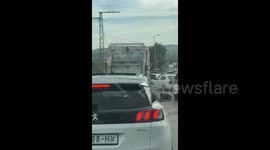 Israeli forces shut down the eastern entrance to the city of Qalqilia in the West Bank, resulting in a traffic jam