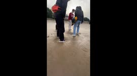 Dangers hidden in fun: Chinese residents frolic in fluid Yellow River mud