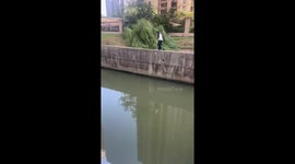 One shot, one catch: Woman in China expertly spears fish with a single strike