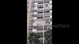 Man rescues boy, 3, dangling from 7th-floor window in heroic fashion
