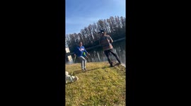Exclusive - Woman tries to push fisherman into water in bizarre confrontation video gets 4.1M views on tiktok