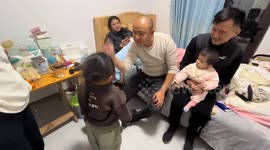 Playful rock-paper-scissors with slaps in Zhejiang, China