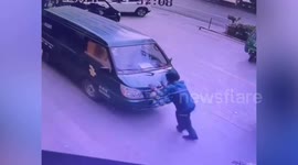 Slapstick scene as two men get increasingly confused by moving van