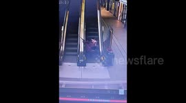Bystanders rush to aid of elderly person tumbling down escalator in China
