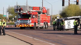 US: Chandler Police Officer and Ride-Along Rescued After Collision at Gilbert and Pecos in Gilbert, AZ