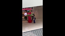 Boy embarrassed after enjoying inflatable standee slaps in Mall of Asia, Philippines