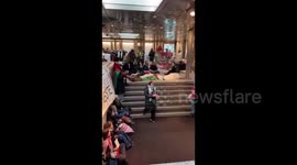 Norway: Activists staged a die-in in the central bank of Norway to demand that their money not be used to sponsor genocide in Gaza