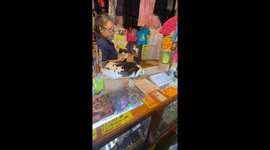 Bunny hands over change and item at Eureka Springs shop