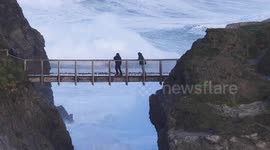 UK Weather, Strong wind deters travel but pleases some, Porth Island, cornwall, UK