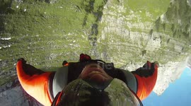 wingsuit flying through a crack