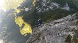 Douggs filming JT Holmes in China wingsuit proximity flying