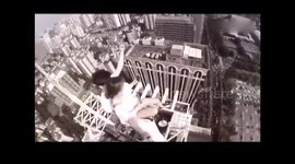 Two couples take selfies on rooftop