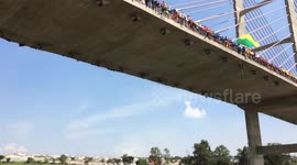 149 people jump off 98ft bridge in Hortolandia, Brazil.