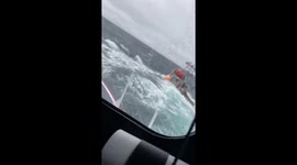 Boat almost sinks in rough seas in Yarmouth, England, UK