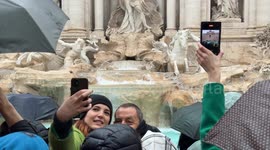 Water flows again from the Trevi Fountain on the day of its inauguration after cleaning work for the Jubilee in Rome.