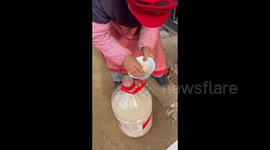 China: Milk Tea Bag Turned Rice Funnel