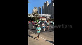 China: Alien Kidnaps a Man during Marathon