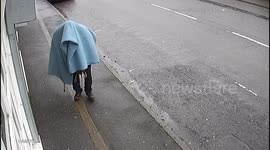 Mystery 'blanket man' caught on CCTV hanging dead pheasants outside shop