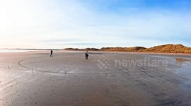It's Sanda Claus! Retired GP marks Christmas with festive artwork on beach